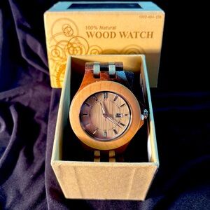 Wooden Watch made of walnut & maple.